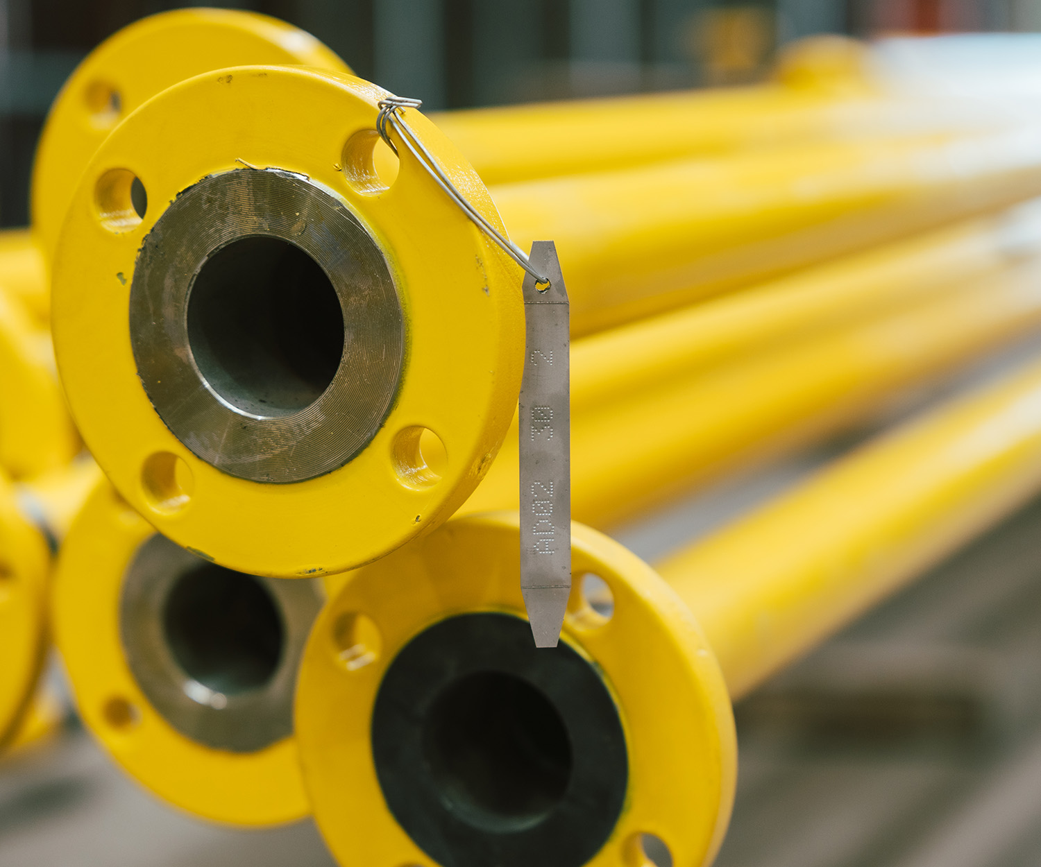 Prefabrication of industrial piping in workshop.